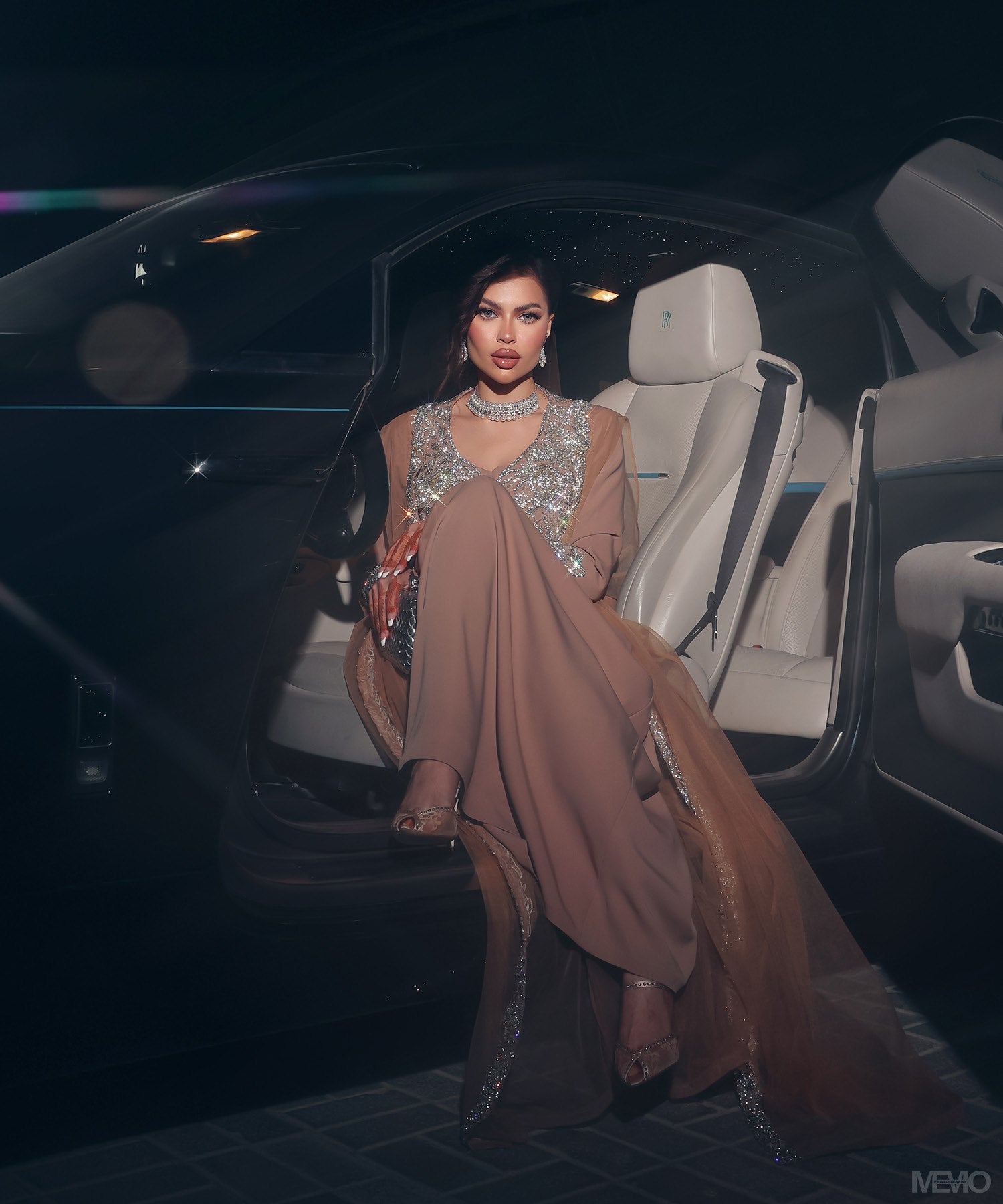 Reem Al Jesmi in a nude crystal-embroidered kaftan