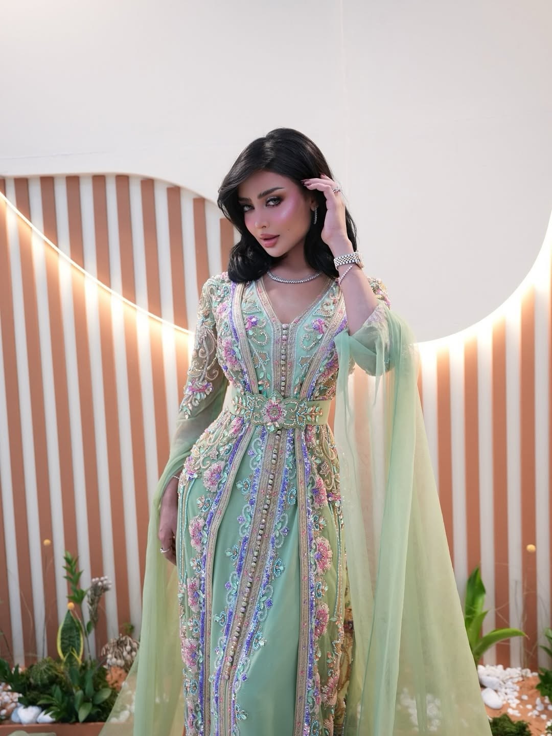 Reem Al Jesmi in a mint embroidered kaftan