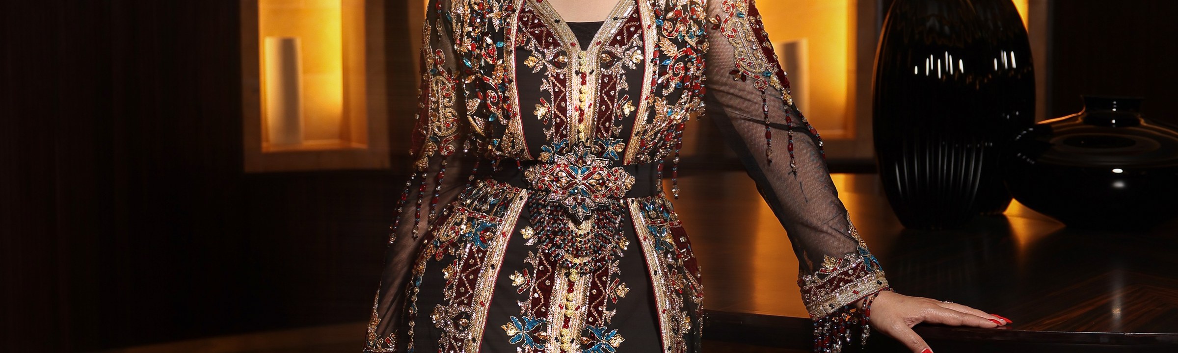 Hand embroidery on a Reem Al Jesmi kaftan