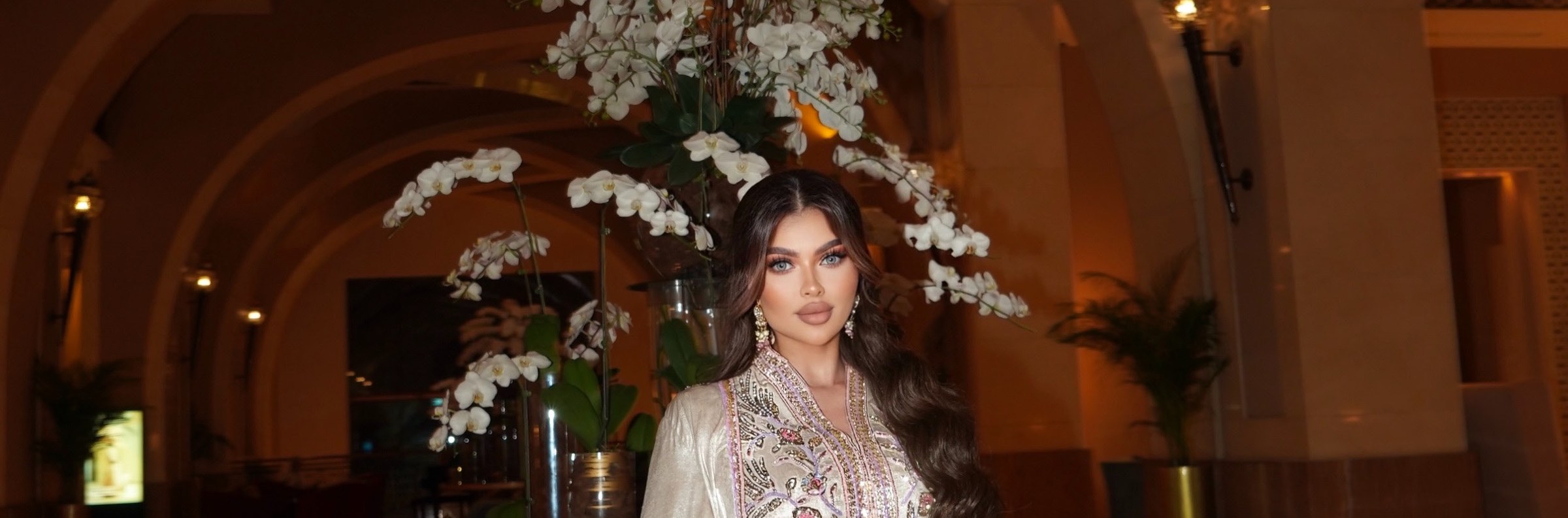 Reem Al Jesmi in ivory and gold