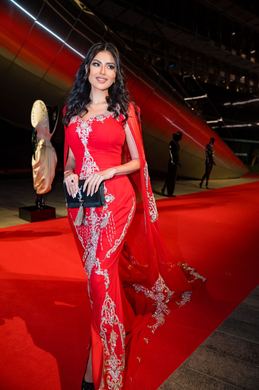 Reem Al Jesmi in a blue and gold kaftan